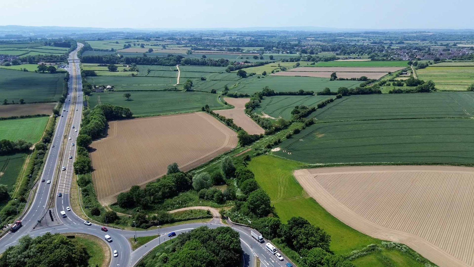 Cartage Roundabout, looking toward Exeter, with the old railway line going towards Martock